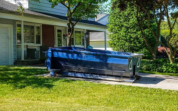 residential dumpsters can be placed on a driveway or lawn, but preventative measures should be required to avoid damage to the property